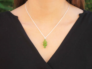 Peridot pendant and silver chain necklace, August and Libra birthstone